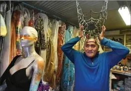  ?? CHRIS RILEY — THE TIMES-HERALD ?? Mario Saucedo, with the Solano AIDS Coalition, talks about one of the many headpieces that will be worn by a Catrina in next weekend’s Dia de los Muertos event in downtown Vallejo.