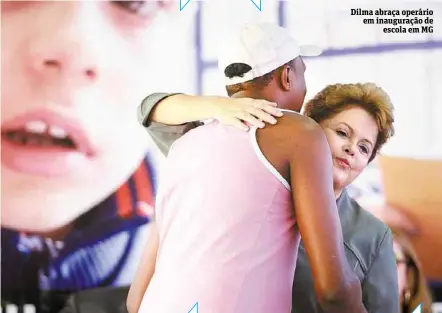  ??  ?? Dilma abraça operário em inauguraçã­o de
escola em MG