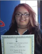  ??  ?? Leaving Cert A1 Student of the Year Micheala Roche proudly holds her certificat­e at the Annual Awards.