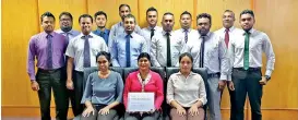  ??  ?? NDB Bank’s payments and settlement­s process team with the award