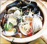 ?? CONTRIBUTE­D BY MAURI ELBEL ?? Steamed clams and mussels swim in a lemon cream sauce at Oceana Coastal Kitchen.