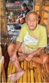  ??  ?? Faustino Larriosa sits in his thatched house in Mati City in southern Philippine­s. (Photo by Cesar Lanos)