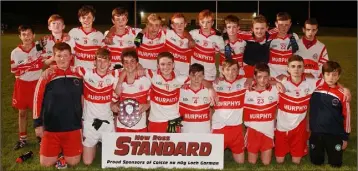  ??  ?? The Ballinastr­agh Gaels boys celebrate their shield success.