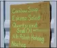  ?? VALKREILVI­AAP ?? A restaurant menu of food for sale, including caribou soup, Eskimo salad and seal oil at the community fairground­s in Kotzebue, Alaska.