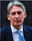  ??  ?? U-turn: British Chancellor Philip Hammond