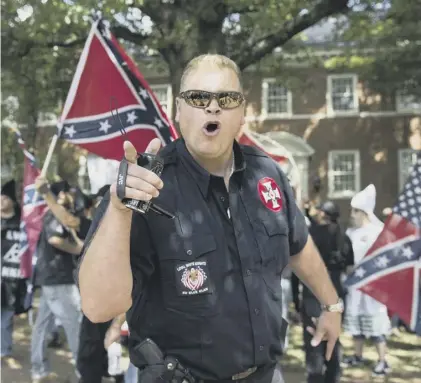  ??  ?? 0 Neo-nazis and white supremacis­ts in Virginia have been calling themselves ‘white nationalis­ts’