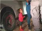  ?? AFP ?? A two-year-old Honduran cries as her mother is searched and detained near the US-Mexico border.