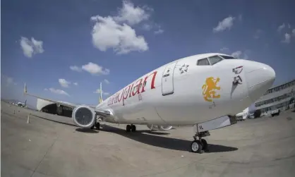  ??  ?? An Ethiopian Airlines Boeing 737 Max 8 plane is grounded at Addis Ababa airport. Photograph: Mulugeta Ayene/AP