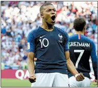  ?? Kylian Mbappe, France’s 19-year-old attacker, scored two goals as the French eliminated Argentina with a 4-3 victory Saturday in the World Cup round of 16 at Kazan, Russia. ?? AP/DAVID VINCENT