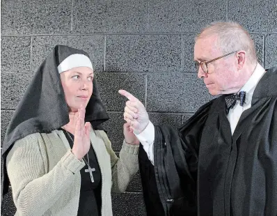  ?? LYNNE JAMIESON PHOTO ?? Lynne Atkinson, as Molly Egan, and Steve O’Brien, as Judge Pulaski in the Players’ Guild of Hamilton production of “Handy Dandy” that opens May 13.