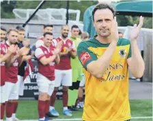  ?? ?? Gary Charman is applauded on to the pitch / Pictures: Steve Robards