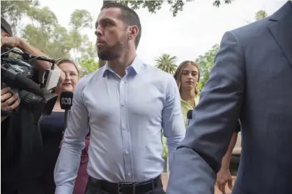  ?? Photograph: Aaron Bunch/AAP ?? Zachary Rolfe arriving at the inquest in Alice Springs on Wednesday. Rolfe was found not guiltyof murder after a NT supreme court trial earlier this year.