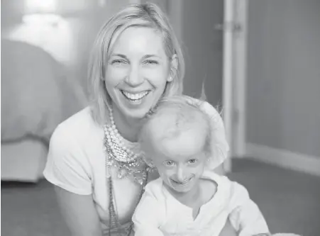  ??  ?? Carly Kudzia, 7, with her mother, Heather Unsinger, in Swanton, Ohio. Carly took part in a study suggesting that the drug Lonafarnib might extend life for children with progeria, which causes rapid aging.