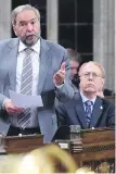  ?? SEAN KILPATRICK, CP ?? Victoria MP Murray Rankin looks on as Thomas Mulcair speaks in the House of Commons last September.