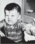  ??  ?? Jeffery Trzeciak, 3, grimaces as a doctor prepares to give him a polio vaccine inoculatio­n on Feb. 23, 1957.