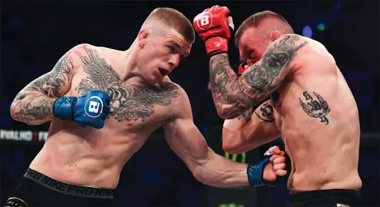  ??  ?? Chris Duncan ( left) during his fight with Mateusz Piskorz at Bellator 240, is unbeaten in the Octagon since turning profession­al