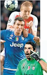  ??  ?? Goalie Buffon (re.) warnt Juve vor Monaco.