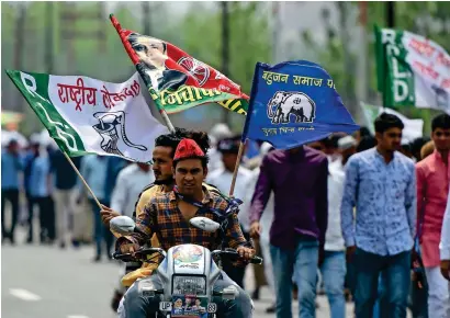  ?? AFP ?? Supporters of the Bahujan Samaj Party, the Samajwadi Party and the Rashtriya Lok Dal at a rally in Deoband in Uttar Pradesh . —