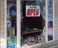  ??  ?? The Pine Tree Garage was vandalized early Tuesday. Windows were broken and a cash box was taken.