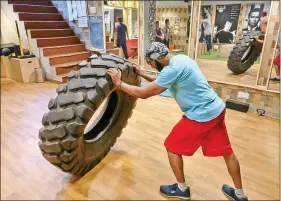  ??  ?? There are many gyms in Delhi providing alternativ­e work-outs. Photo: Strength Box, Model Town.