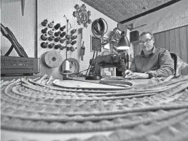  ?? ALLAN JUNG/TELEGRAM & GAZETTE ?? Paul Shays, owner of John Shays Custom Upholstery on Water Street, creates the decorative trims for sofa cushions called welts.