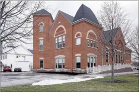  ?? CARRIE GARLAND — FOR THE NEWS-HERALD ?? Renovation­s recently were completed at Mentor’s Old Village Hall for use by NMS Inc. accountant­s.