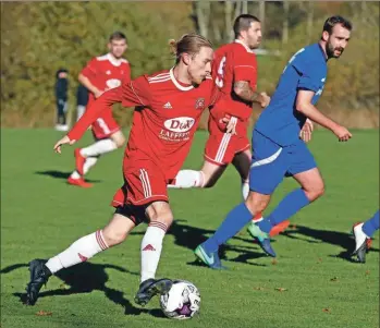  ??  ?? Saints’ two-goal hero Lewis Cameron drives forward.