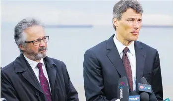  ?? RICHARD LAM/FILES ?? Vision Vancouver co-founder Geoff Meggs, left, departed for Victoria last year and Vancouver Mayor Gregor Robertson has announced he won’t run again this fall.