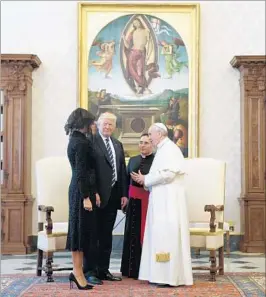  ?? EVAN VUCCI/AP ?? President Donald Trump and first lady Melania Trump meet Wednesday with Pope Francis.