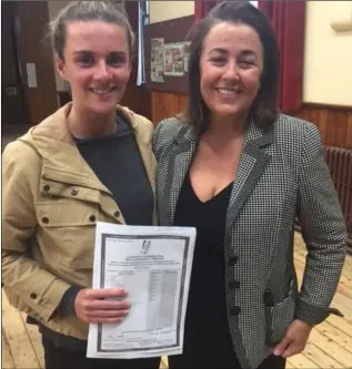  ??  ?? Roisin Kelly pictured with St Vincent’s Principal, Deirdre Matthews after collecting her results last Wednesday morning.