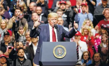  ?? THE ASSOCIATED PRESS ?? President Donald Trump gives two thumbs up while speaking at a rally Wednesday in Nashville.