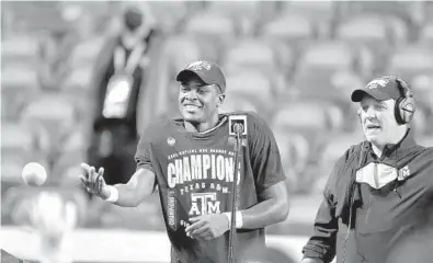  ?? MICHAELLAU­GHLIN/SUN SENTINEL ?? Texas A&M running back Devon Achane tosses oranges to his teammates after he was named MVP of the Orange Bowl on Saturday at Hard Rock Stadium.