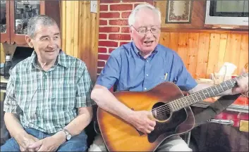  ?? THE CANADIAN PRESS/HO-REBECCA DRAISEY-COLLISHAW ?? Aidan O’Hara, right, performs with Gerald Campbell in a July 31, 2018, handout photo.