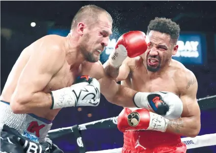  ?? AP FOTO ?? THIRD ONE? Sergey Kovalev’s camp said there was a low blow and that the ref erred in stopping the fight in the eighth round.