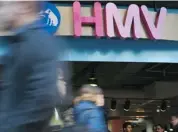  ?? BEN STANSALL/AFP/GETTY IMAGES ?? An employee at British music retailer HMV hijacked the company’s official Twitter account Thursday.