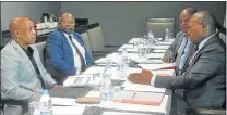  ?? Picture: SIKHO NTSHOBANE ?? UNDER PRESSURE: Eastern Cape Premier Phumulo Masualle, Cogta Deputy Minister Obed Bapela, Cogta MEC Fikile Xasa and Cogta Minister Zweli Mkhize meet in Mthatha yesterday