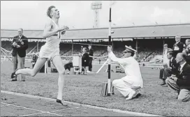  ?? GETTY IMAGES ?? 10th July 1954: Roger Bannister winning the AAA Championsh­ips Mile race. (Photo by L. Blandford/ Topical Press Agency/Getty Images)