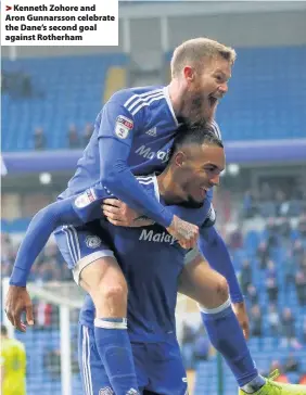  ??  ?? > Kenneth Zohore and Aron Gunnarsson celebrate the Dane’s second goal against Rotherham