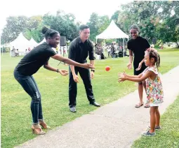  ??  ?? From left: Jizelle Lawes, Samir Velez, Fiona Daniel and Kaelyn Lawes are enjoying an exciting ball game.