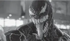  ?? Sony Pictures ?? Tom Hardy plays an investigat­ive reporter who becomes one with an alien symbiote in “Venom.”