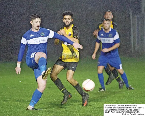  ?? ?? Cwmamman United’s Sion Williams receives close attention from Port Talbot’s Manny Mahoney in their Ardal League South West clash. Port Talbot won 2-1.
Picture: Gareth Hughes.