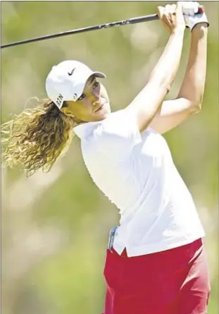  ?? EPA ?? Take notes, Tiger! Cheyenne Woods bolts into sole possession of lead at Ladies Masters in Australia, one shot better than Stacey Lee Bregman heading into final round.