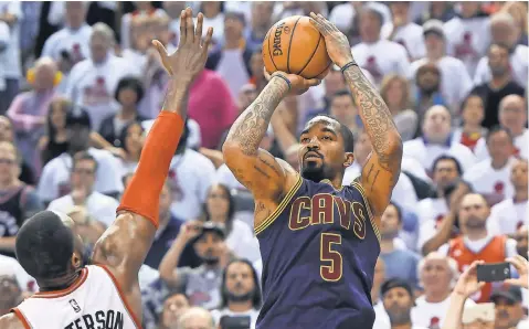  ?? DAN HAMILTON, USA TODAY SPORTS ?? Guard J. R. Smith, right, shot a combined 9- for- 26 on three- pointers in the Cavaliers’ Games 3 and 4 losses to the Raptors. Overall in the series, Cleveland has hit 33.3% of its three- point attempts.