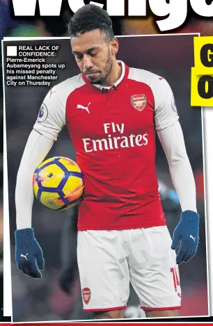  ??  ?? REAL LACK OF CONFIDENCE: Pierre-Emerick Aubameyang spots up his missed penalty against Manchester City on Thursday