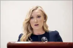  ?? Mike Caudill / The Virginian-Pilot photo via AP ?? Lawyer Diane Toscano, who represents Abigail Zwerner, the Newport News teacher who was shot by a 6-year-old student, reads a statement to media on Wednesday, in Newport News, Va.