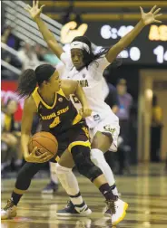  ?? D. Ross Cameron / Special to The Chronicle ?? Arizona State’s Klara Russell looks for an open teammate around Cal’s MiCole Cayton.