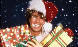  ??  ?? George Michael promoting Wham!’s 1984 single Last Christmas. Photograph: Pictorial Press Ltd/Alamy