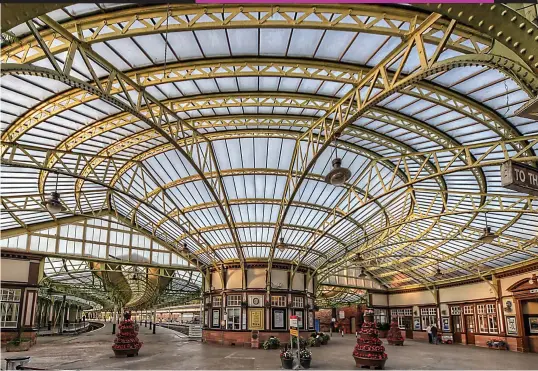  ??  ?? Well worth the journey: Wemyss Bay, with its magnificen­t glass canopy, is one of the finest old railway stations to be found in Europe