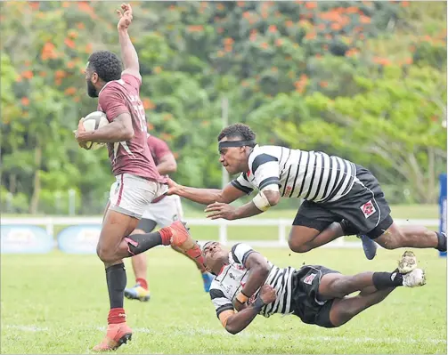  ?? ?? Lautoka’s Josese Bola looks for support during Rewa’s challenge of the Vanua Trophy Challenge yesterday.