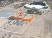  ?? BRANDON HARDER ?? Evraz Place and Mosaic Stadium are shown in this aerial photo. Council has approved a developmen­t plan for the city's downtown.